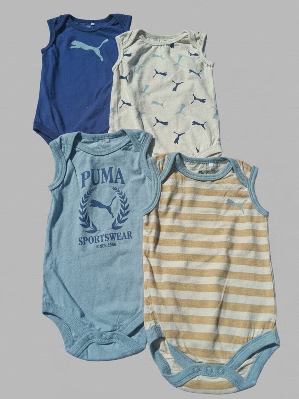 Puma 4-Pack Sleeveless Bodysuits 6-9M NWT Minor Defects